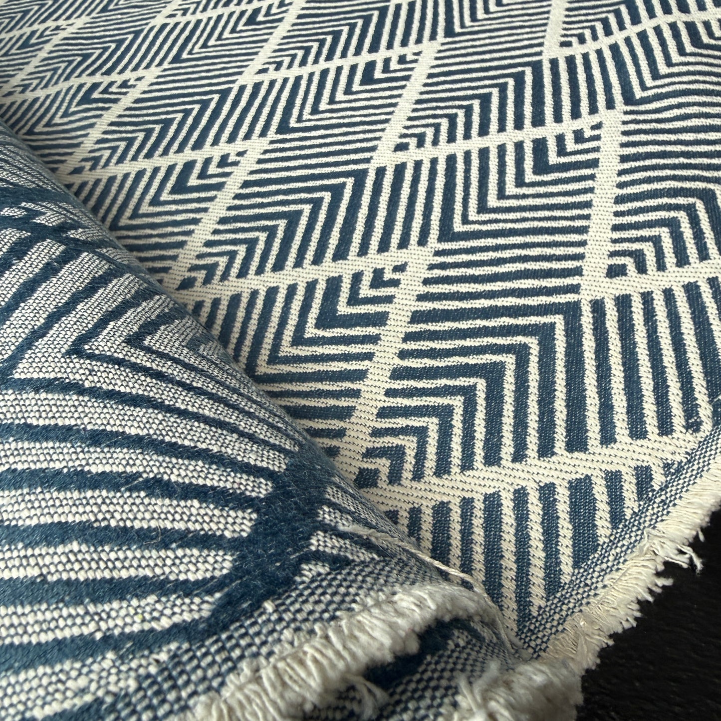The Nordic Chevron Collection - Jacquard Tapestry in Wedgewood color, showcasing a modern geometric pattern with textured hand feel, perfect for home decor and upholstery projects.