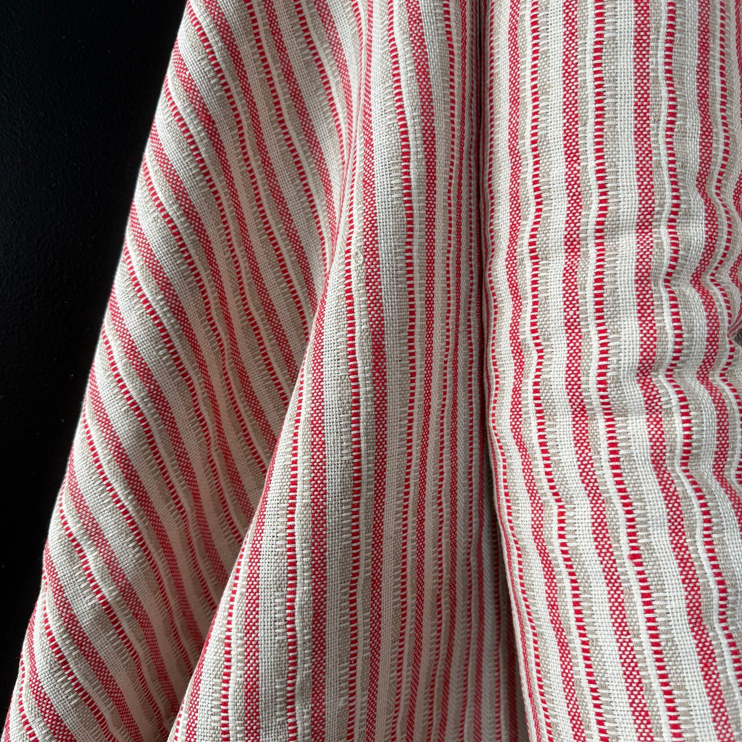 The Heritage Stripe Collection Jacquard Tapestry in red, light fawn, and natural colors showcasing its textured hand-loomed feel and artisanal character, perfect for upholstery, bags, and home decor.