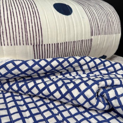 Reversible Minimalist Dot Block + Blue Lattice - Quilted Bagru Indian Cotton Block Print fabric highlighting its vibrant colors and artisanal craftsmanship.