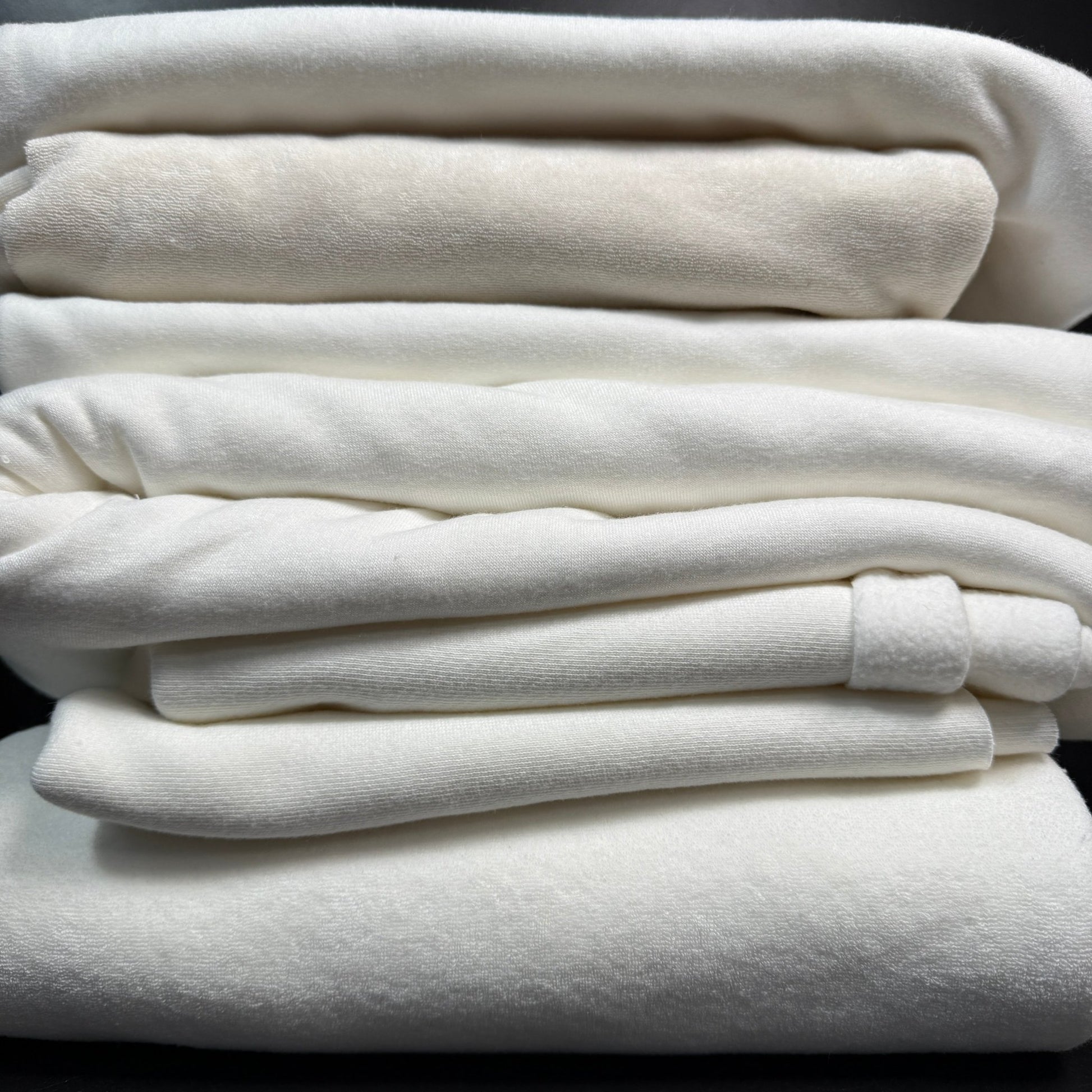 SALE BOX 1811F by Sale Box featuring various fabric samples including bamboo baby fabric, winter white baby fabric, medium USA fleece, and OC baby fabric, perfect for trying out quality materials.